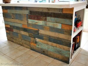 A kitchen island made out of wood pallets