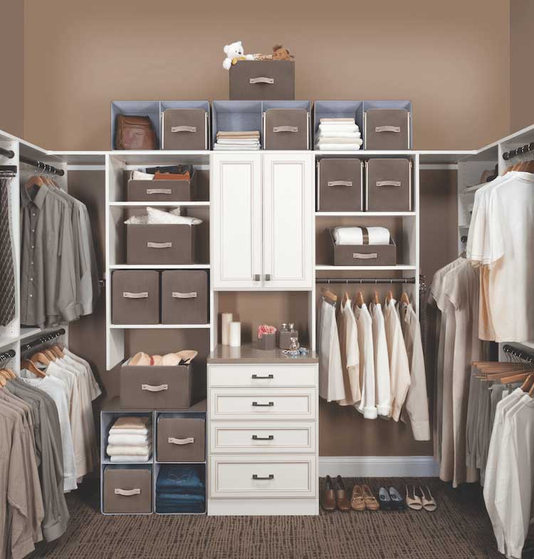 A white and cream and brown-colored walk-in closet