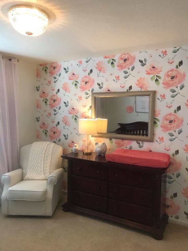 A dresser in a nursery doubles as a changing table 