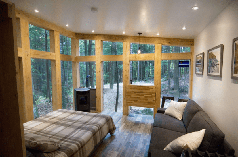 The bedroom of a tiny house in Maine