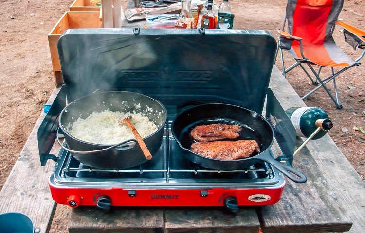 making lunch on camping propane stove