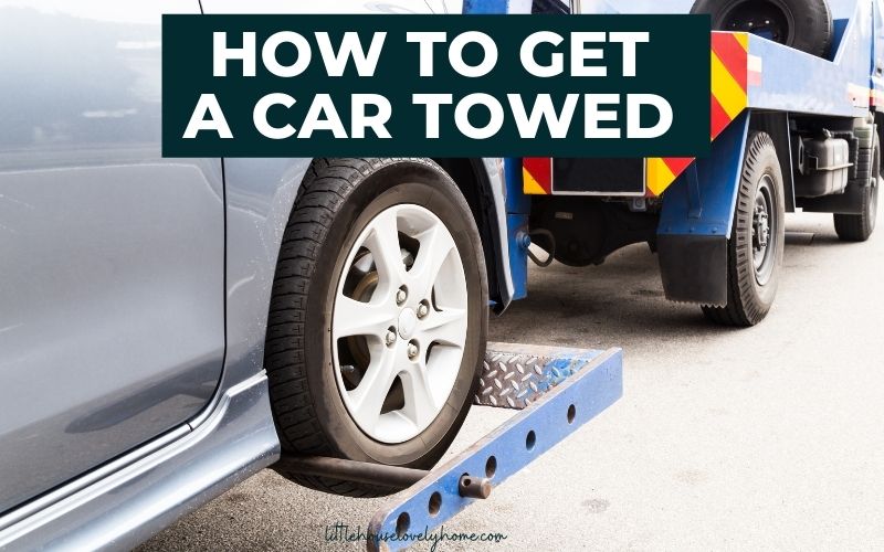 Image of car front right wheel in towing contraption attached to tow truck with text overlay that reads "How to get a car towed".