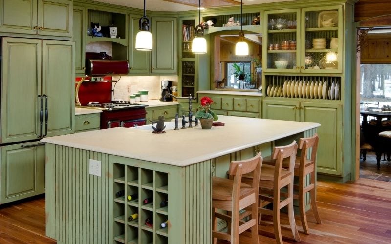 Photo of a kitchen painted with green color