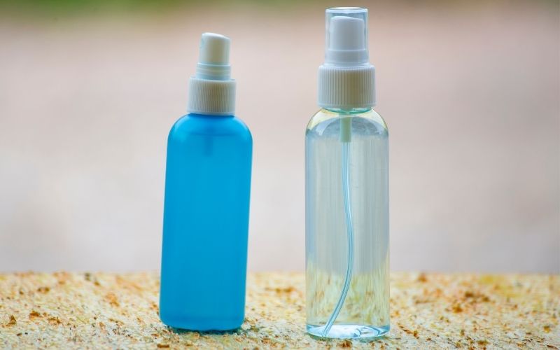 Photo of two small plastic spray bottles