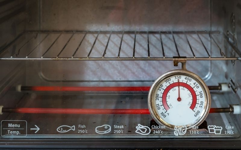 Image showing an oven thermometer inside an oven