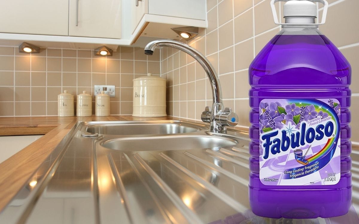 IPhoto of a stainless steel kitchen top and sink with fabuloso on it