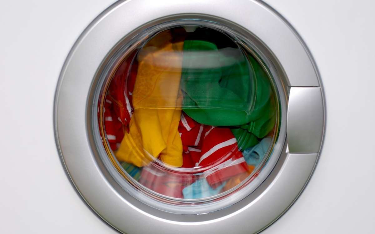 Photo showing clothes inside a washing machine