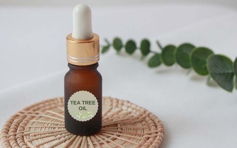 Photo showing a brown bottle with label that reads Tea tree oil