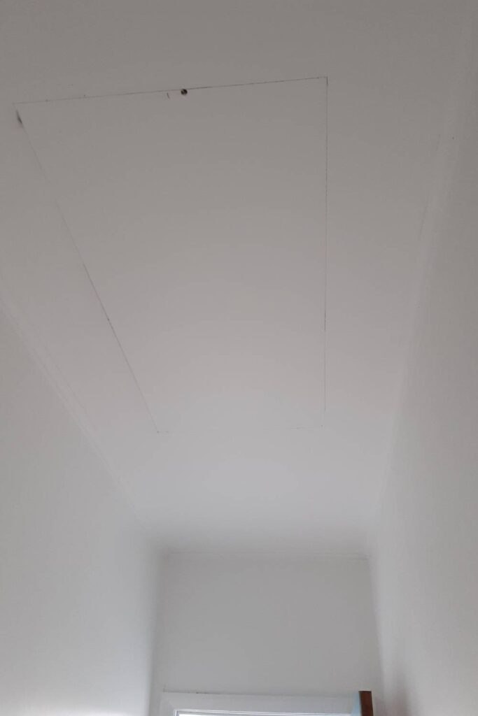 Pencil lines sketched on a white ceiling