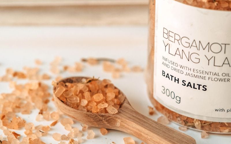Image showing brownish granules beside a jar with the label bath salts